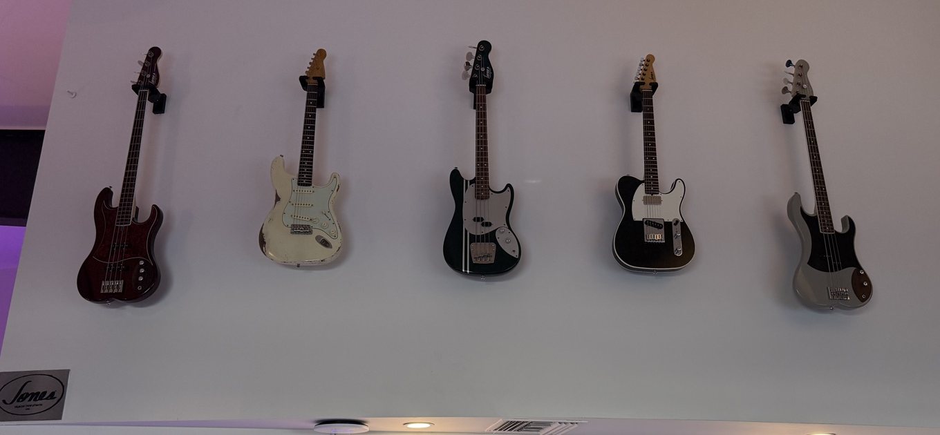 Five Jones instruments hanging on the wall at The Recording Club: Gresham, Stratham, Mach II, Telham, Chatham, left to right.